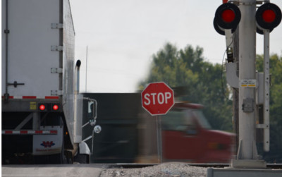 Truck At Railroad Grade Crossing